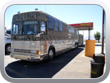 The Camo wrapped tour bus from the Honky Tonk Tailgate Party